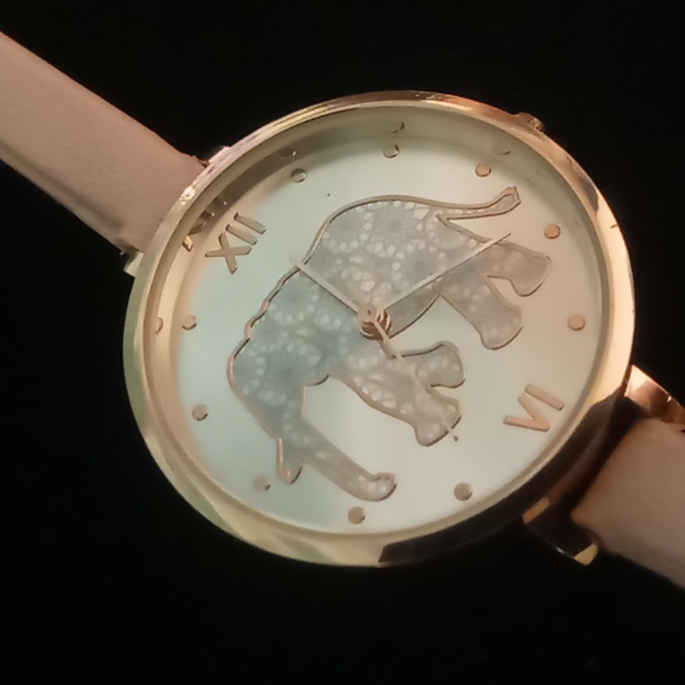 Jessica Carlyle elephant watch Stainless steel back pink thin leather band